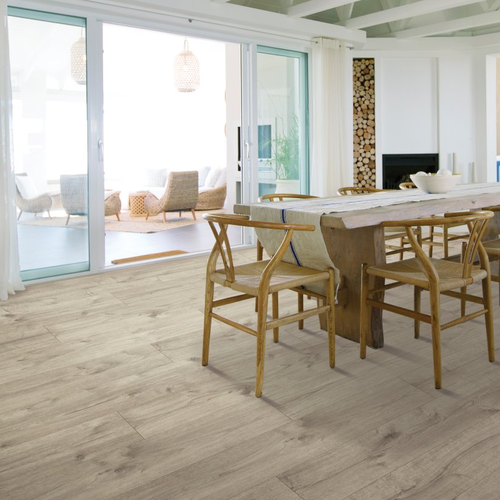 Dinning room with laminate flooring -  Tanner Place - Artifact Oak