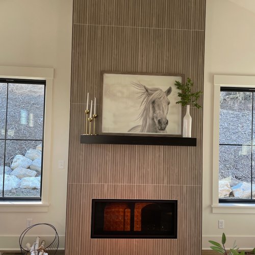 Contemporary fireplace installed by Adair's Flooring
