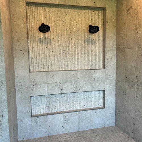 Rustic concrete style tile shower by Adair's Flooring in Lititz, PA