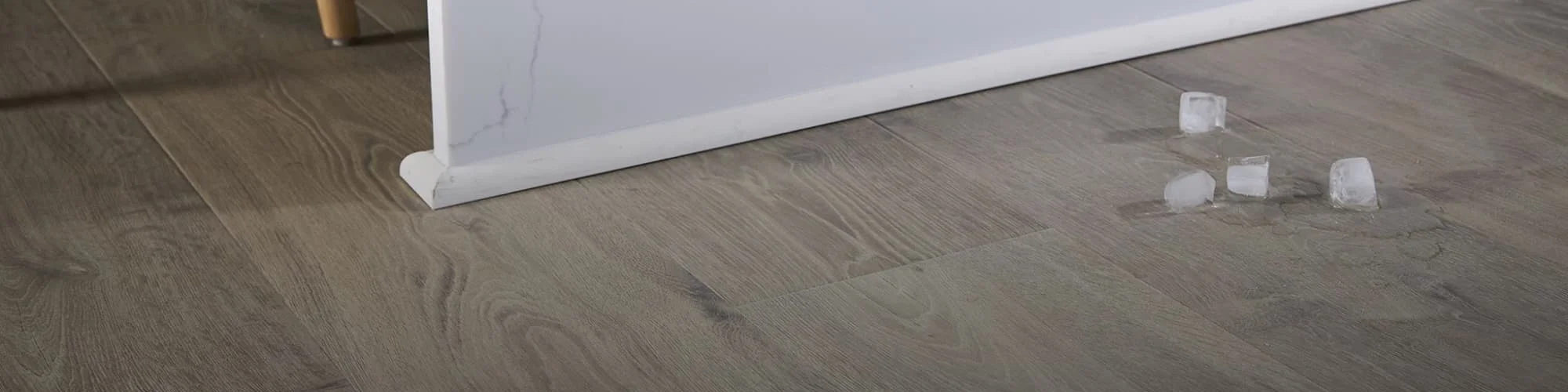 BelleLuxe Waterproof flooring standing up to spilled ice
