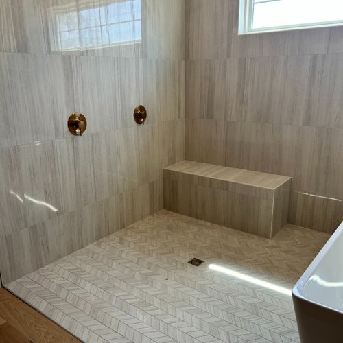 Textured tile walls installed in a shower by Adair's Flooring in Lititz, PA