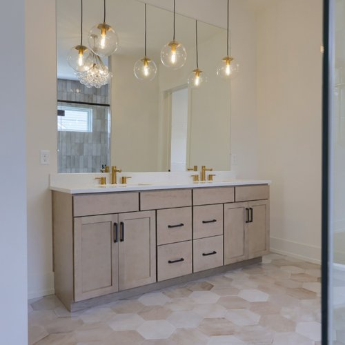Modern bathroom with new tile floors by Adair's Flooring in Lititz, PA