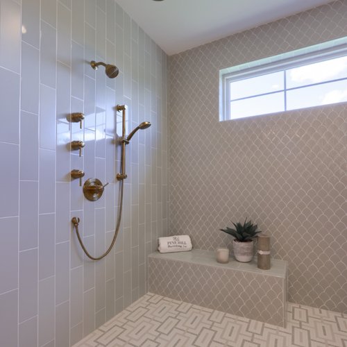 Trendy dove grey tile in a shower